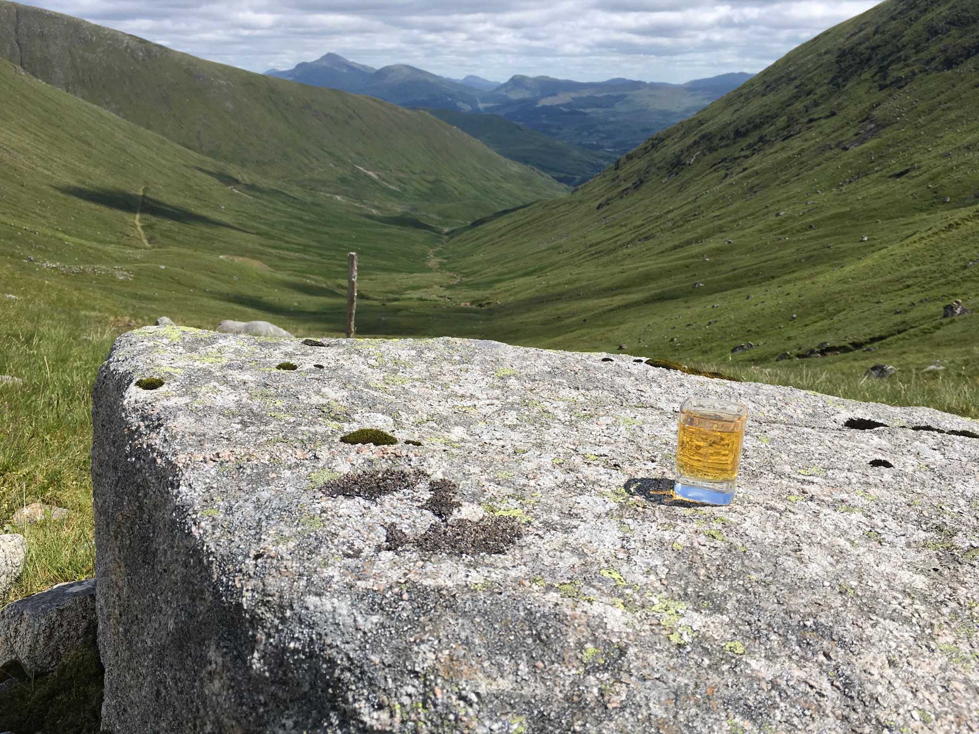 Cliff overlooking beautiful green valley